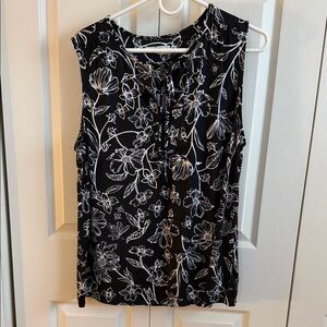 Elegant Black and White Floral Sleeveless Blouse